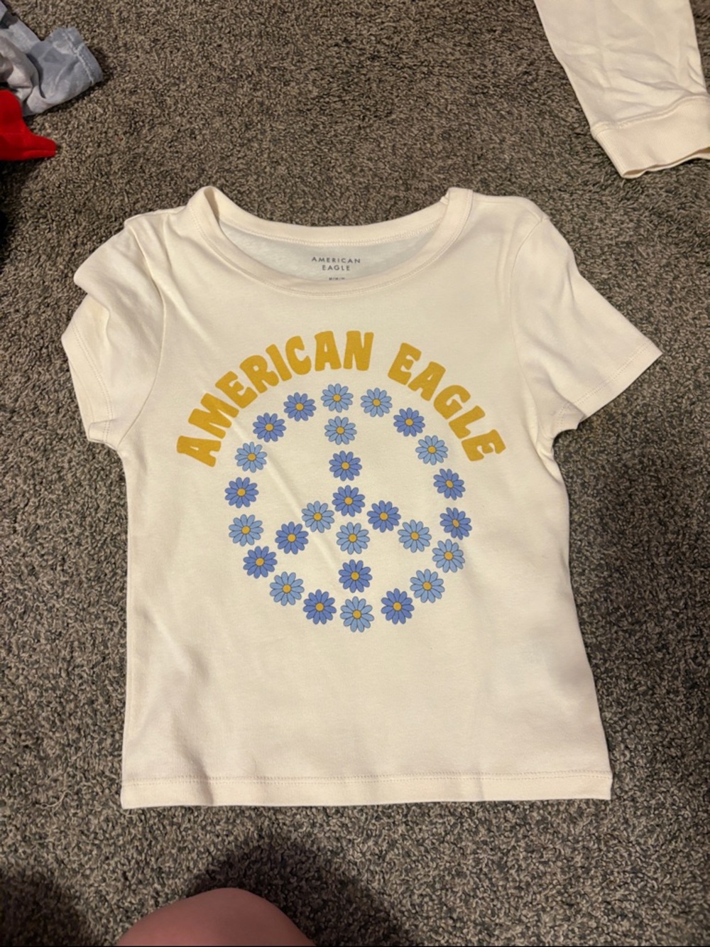 American Eagle Outfitters Girls' Cream T-Shirt with Blue Daisy Peace Graphic